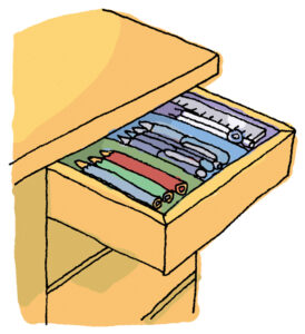 デスクの引き出しを開けている様子